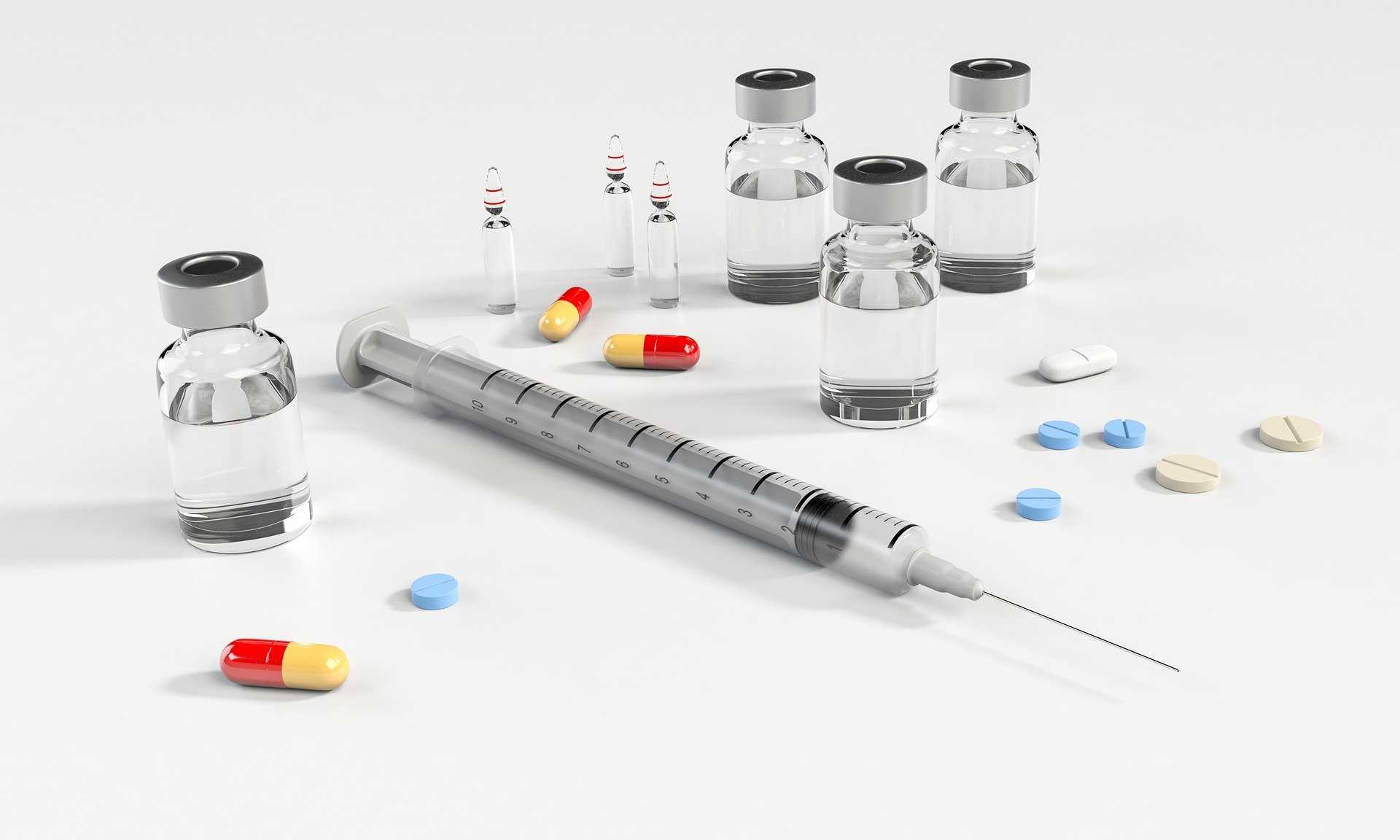 Pills and a syringe